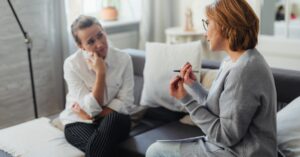 adult daughter caring for an aging parent seeks help from advisor