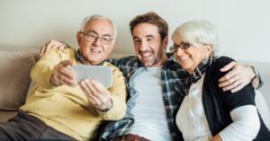 family talking with aging parents at home about care decisions – Heartfelt Senior Solutions senior living guidance blog