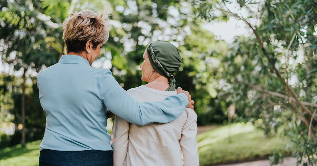 Senior living community walkway with greenery and sunshine representing new beginnings – Heartfelt Senior Solutions blog
