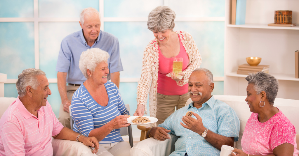 understanding assisted living misconceptions showing happy seniors engaged in community life