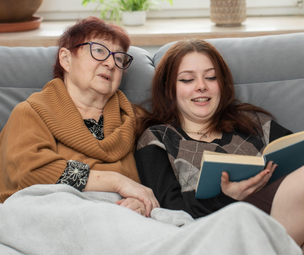 daughter spending relaxed time with parent during senior living adjustment