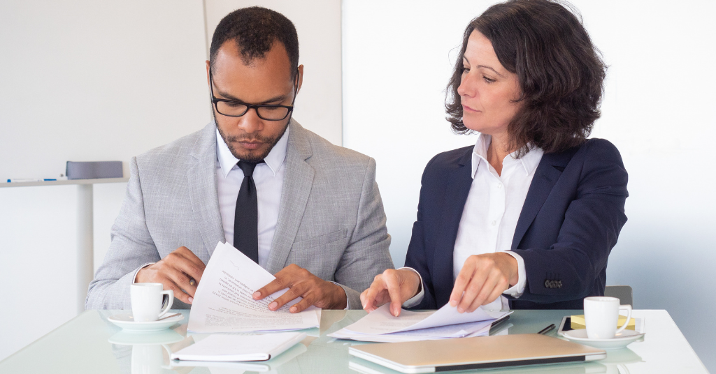 family reviewing senior living costs and contract fees